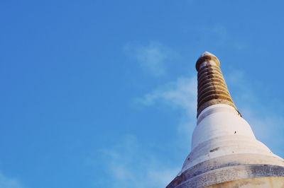 Low angle view of smoke stack against sky