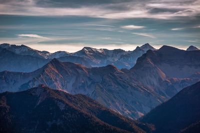 Scenic view of mountains against sky during sunset