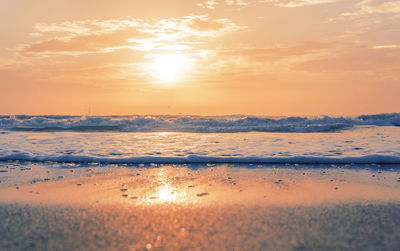 Scenic view of sea against sky during sunset