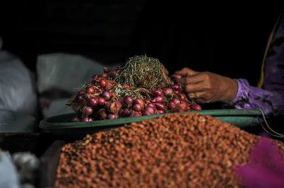 Midsection of woman holding food