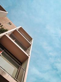 Low angle view of modern building against sky