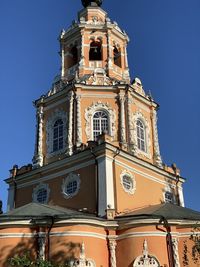 Low angle view of ornate building against clear sky