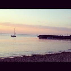 Scenic view of sea at sunset