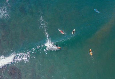 High angle view of people on sea