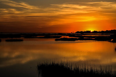 Scenic view of sunset over sea