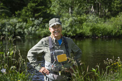 Man fishing in river