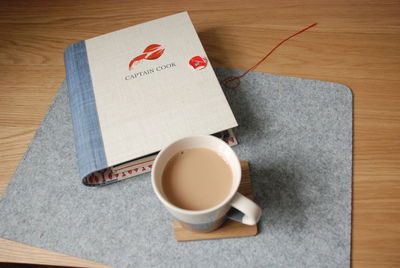 High angle view of coffee cup on table