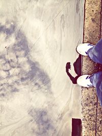 Low section of man standing