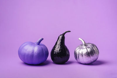 Close-up of baubles against white background