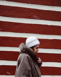 Woman with umbrella on snow