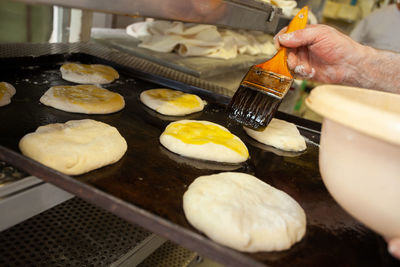 Production of baked bread in a bakery. 