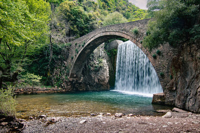 The imposing and beautiful bridge of palaiokarya, with its two artificial waterfalls.