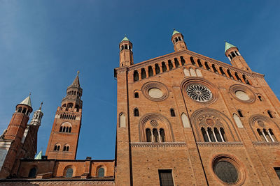 Low angle view of building against blue sky