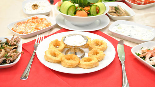 High angle view of food served on table