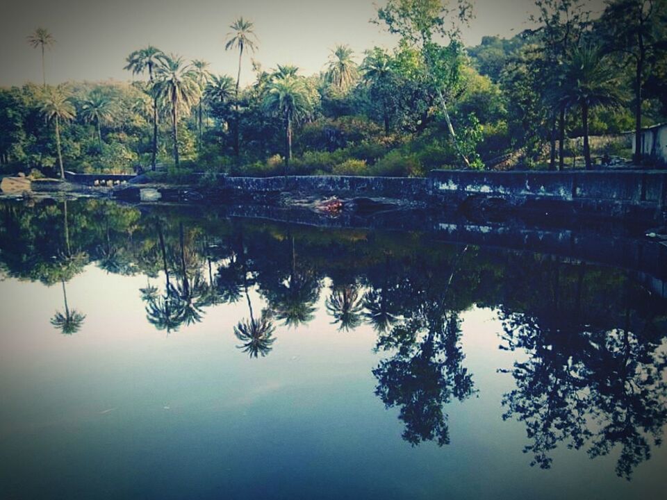 SCENIC VIEW OF CALM LAKE