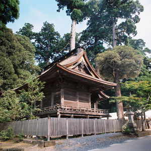 Temple by trees against sky