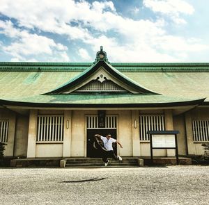 Built structure against cloudy sky