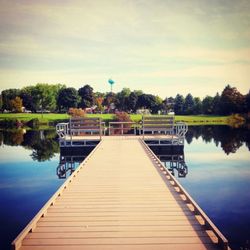 View of pier on calm lake