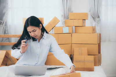 Young woman working in stack