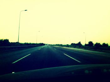 Road passing through car windshield