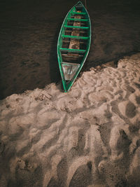 High angle view of sunglasses on beach