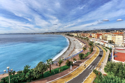 High angle view of road by sea against sky