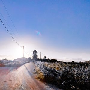 Road against sky during winter