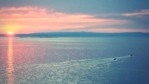 Scenic view of sea at sunset