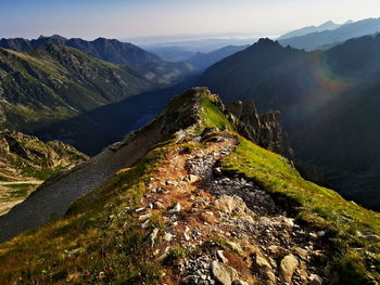 Mountain trail in the morning. mountain landscape with the rising sun.