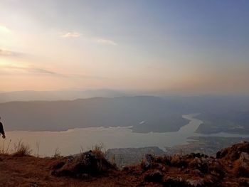 Scenic view of landscape against sky during sunset