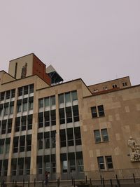 Low angle view of buildings against clear sky