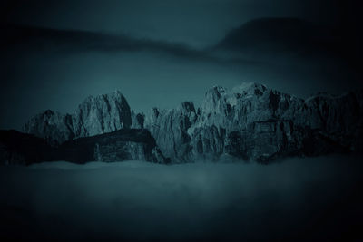 Scenic view of landscape against sky at night