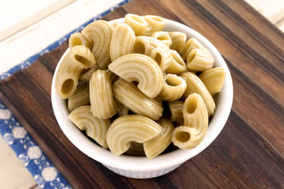 High angle view of pasta in plate on table