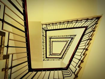 Low angle view of spiral staircase in building