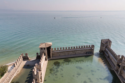 High angle view of groyne on sea