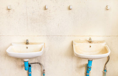 Close-up of faucet in bathroom