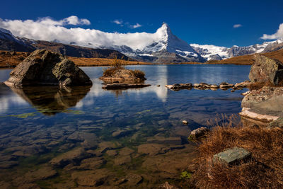 Reflection of the matterhorn in stellisee lake