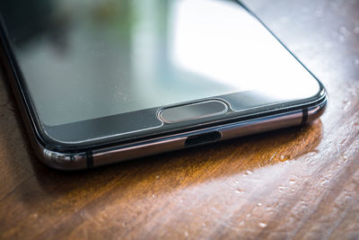 Close-up of smart phone on table