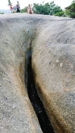 Close-up of person on rock