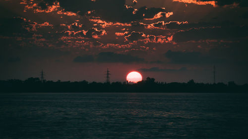 Scenic view of silhouette tree against sky during sunset