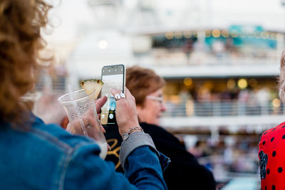 Portrait of woman using mobile phone