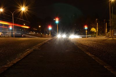 Illuminated street at night