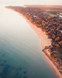 Aerial view of sea during sunset