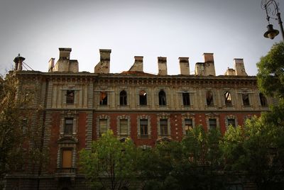 Exterior of historic building against clear sky