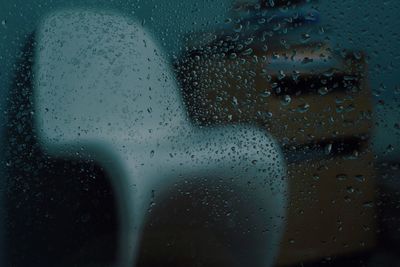 Close-up of raindrops on glass window