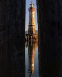 Reflection of lighthouse in lake