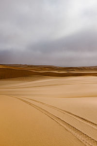 Scenic view of desert against sky