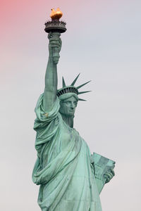 Low angle view of statue against sky