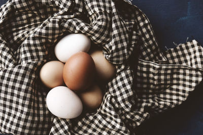 High angle view of eggs in container