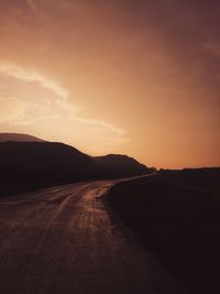 Scenic view of landscape against sky during sunset